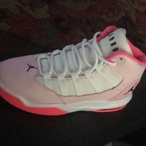 Jordan’s . size 4 , colors is pink white & black .